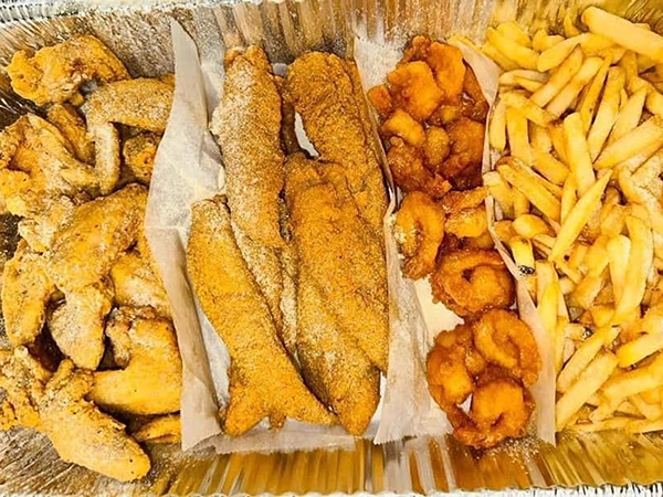 Ocean House family combo with fried fish, chicken, shrimp and fries